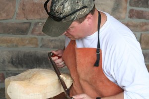 Decoy carver Nathan Grace carving an eide decoy at the Connecticut Waterfowler's Show.